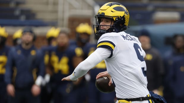 Michigan Wolverines quarterback J.J. McCarthy (9) passes during the Spring Game at Michigan Stadium.